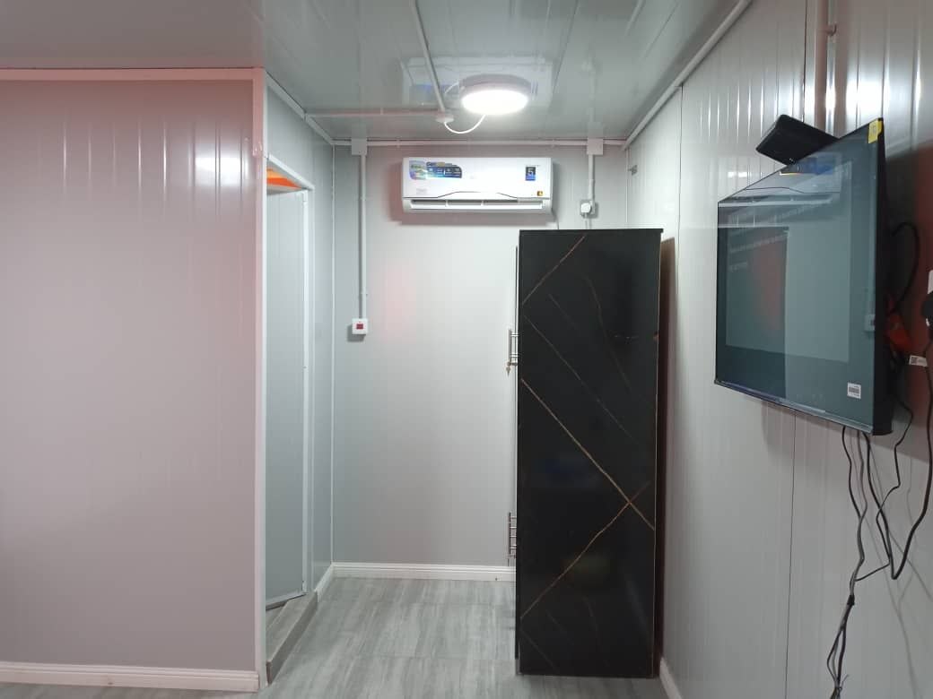 Modern executive suite interior with AC and en-suite access
